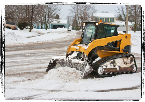 Image: Removing snow from residential street.